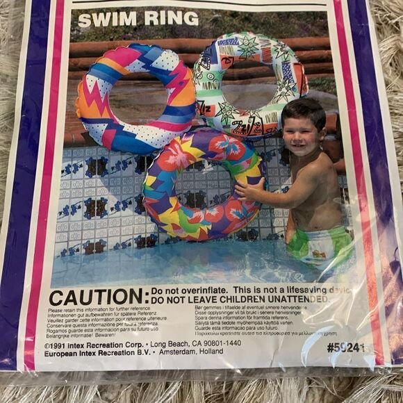 New Vintage 1991 Intex # 59241
The Wet Set Swim Ring Pool Float
24” - Picture 8 of 14